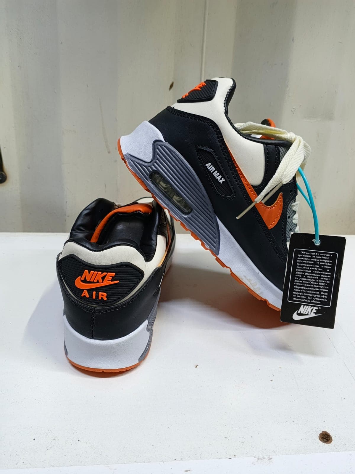 Black & Orange Jordan 4s