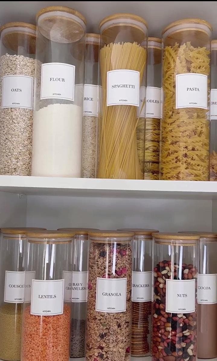 Borosilicate Glass Pantry Jars with Airtight Bamboo Lids and Minimalist Labels.