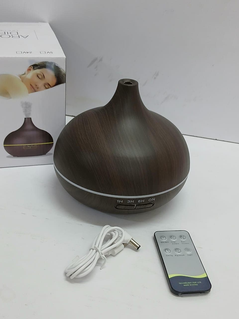 Ultrasonic Wood Grain Essential Oil Diffuser and Humidifier with Remote Control.